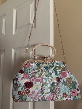 Embroidered floral clutch bag